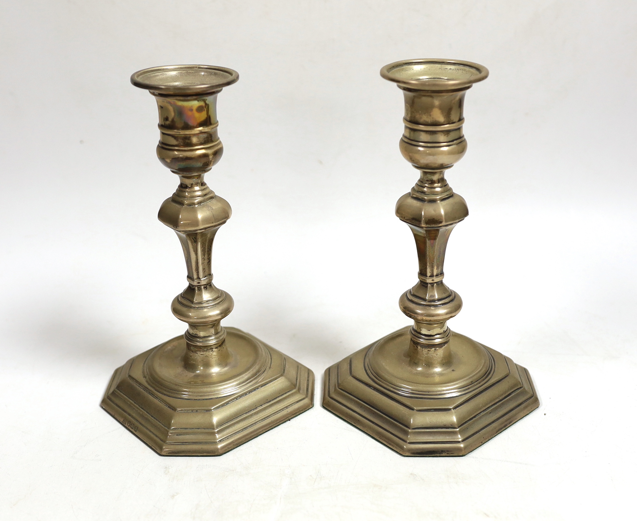 A pair of Edwardian 18th century design candlesticks, by Thomas Bradbury & Sons Ltd, London, 1907, height 17.6cm, weighted.